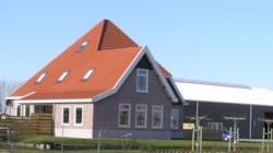 Woning met bedrijfsruimte